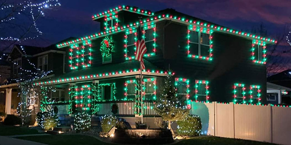 Hiring a professional Christmas light installer like Save Your Glass for your Spokane home keeps you off the ladder.